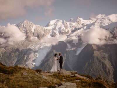 A couple elopes in the mountains near Chamonix, France.