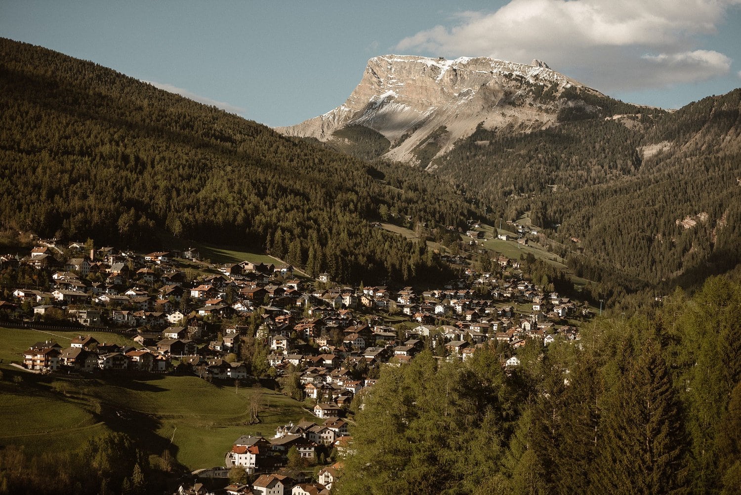 Landscape of town and Italian Alps in South Tyrol. 