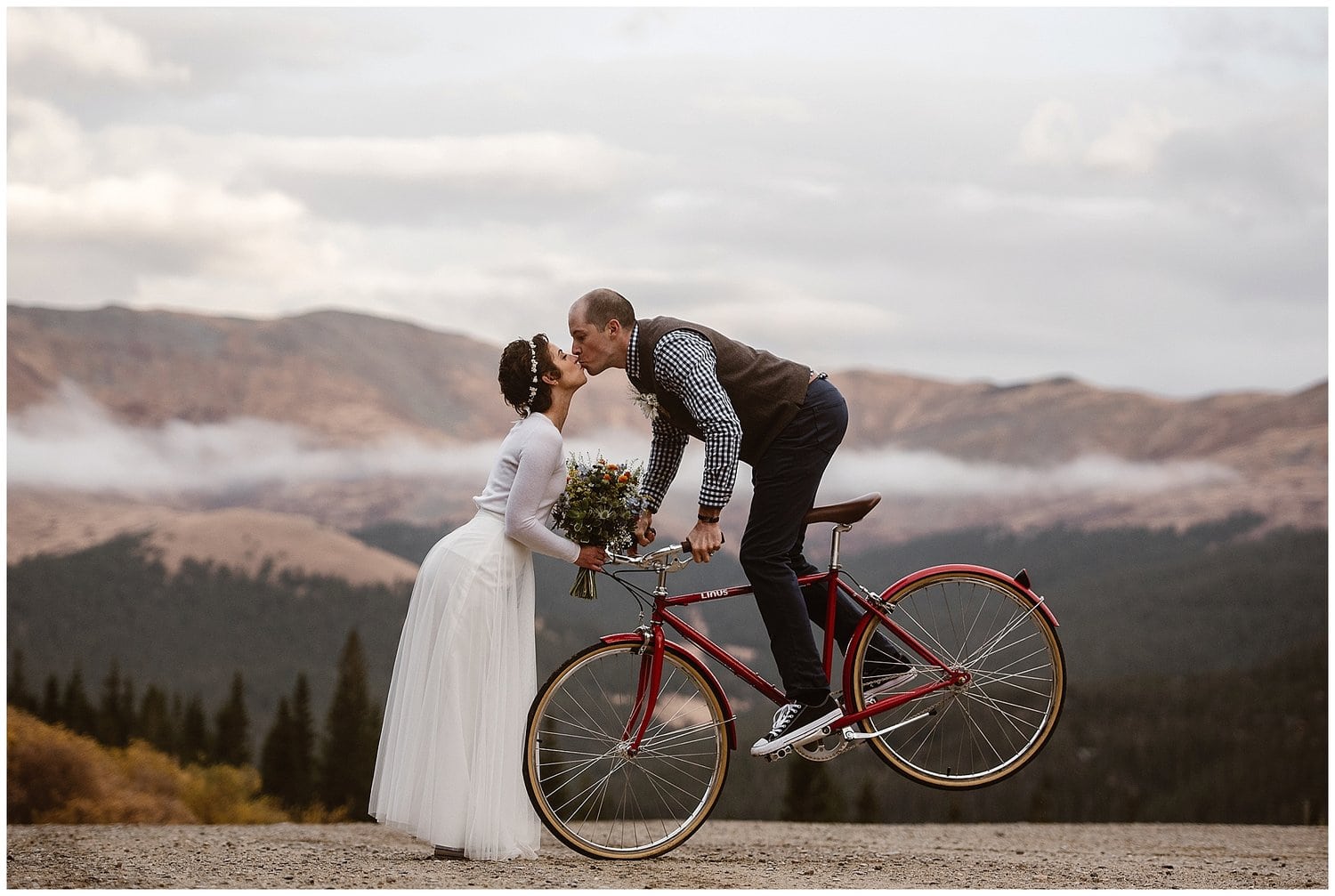 Groom rides bike and kissed bride. 