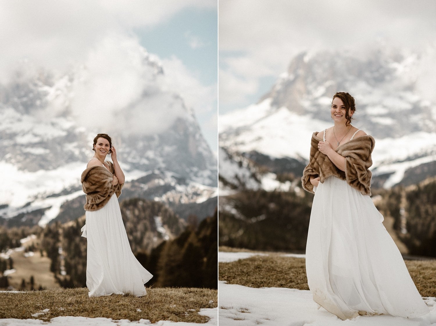 Bride smiles and is wearing a white dress with a brown fur shawl, with snow-cover Italian Dolomites in the background. 