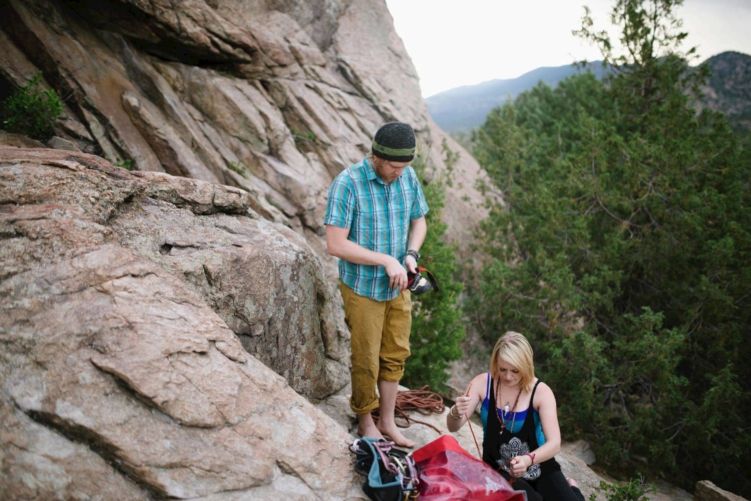 Couple unpacking their rock climbing gear on a mountain in Buena Vista, Colorado. 