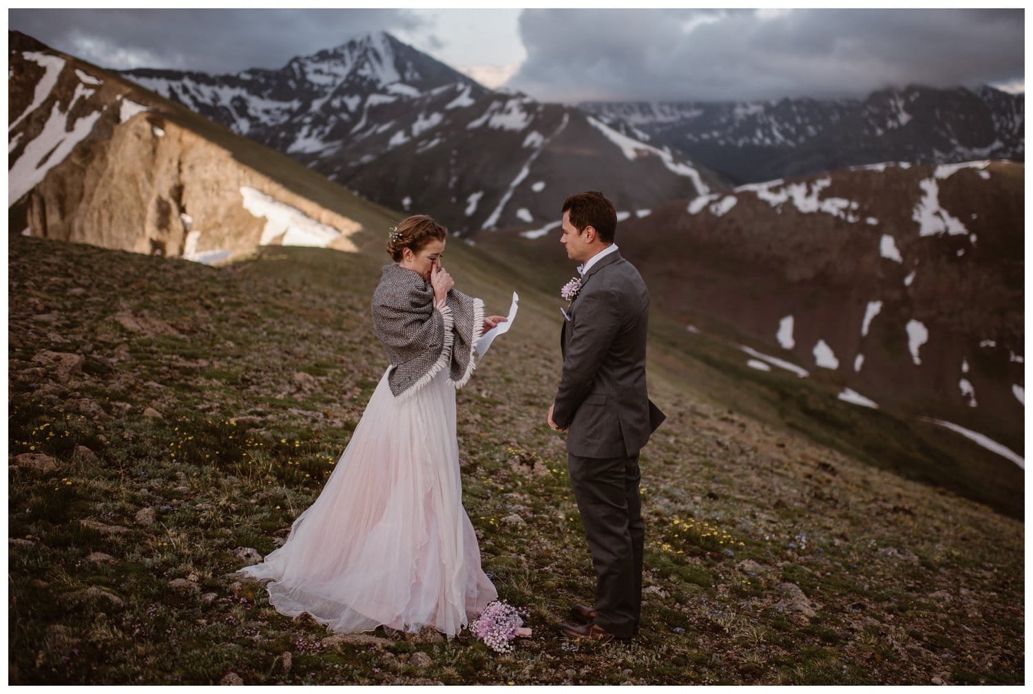 Bride reads her vows during a sunrise hiking elopement near Aspen, Colorado. 