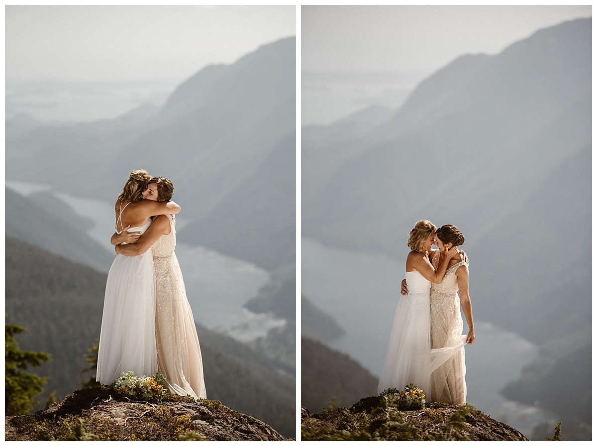 Two brides embrace during intimate elopement ceremony on a glacial mountain in Tofino, Canada. 