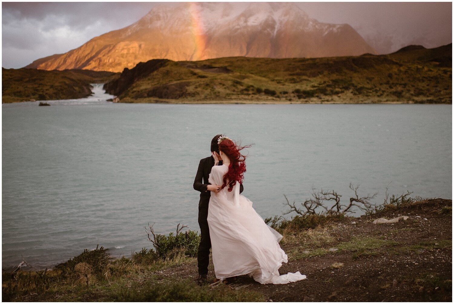 A couple embraces on their wedding day in Patagonia.