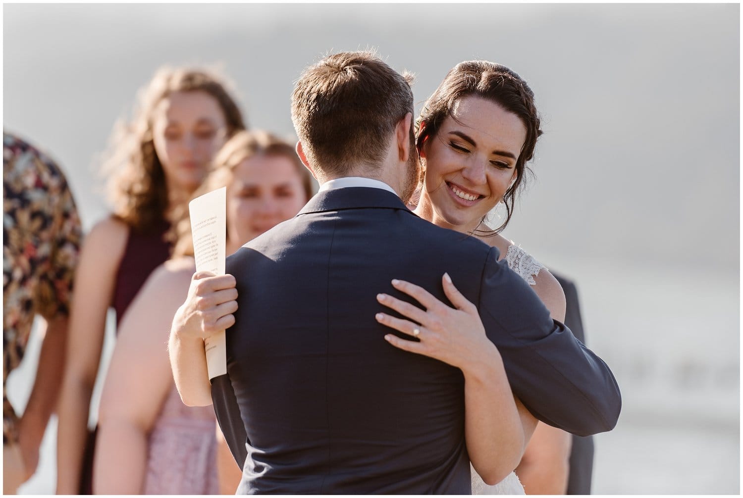 Bride and groom embrace during their intimate elopement ceremony at the Columbia River Gorge, in Oregon. 