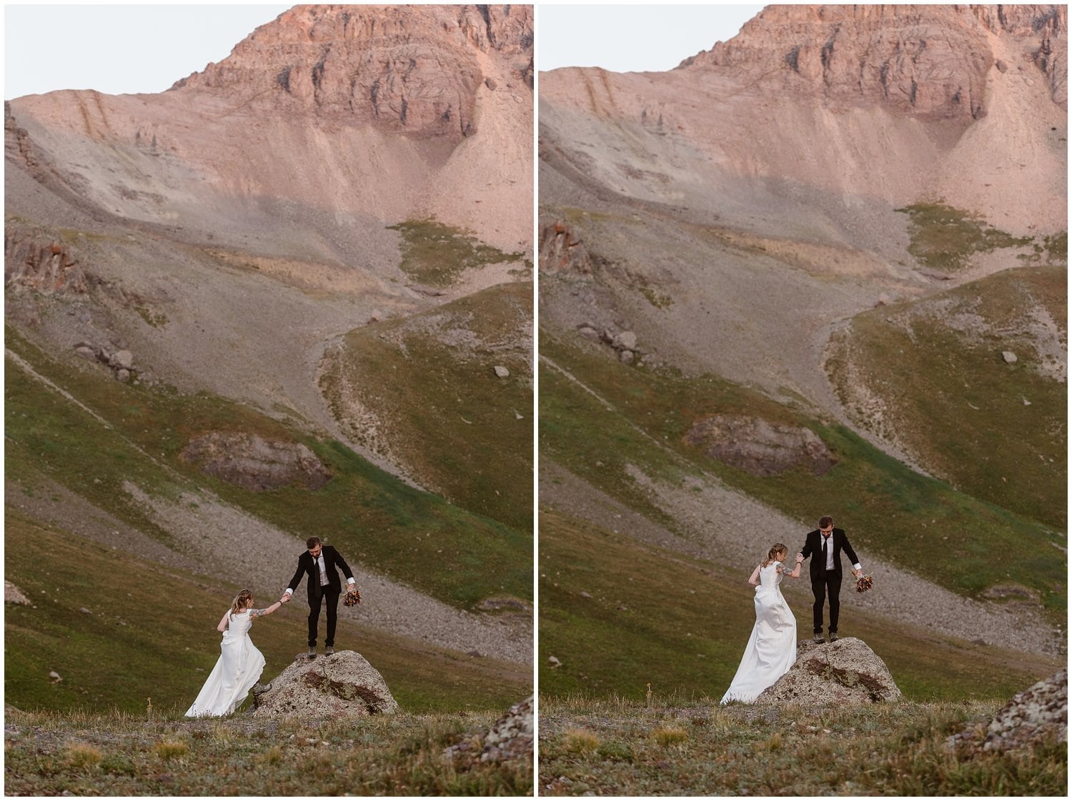 Bride and groom climb up rock together, with mountain in the background, in Ouray, Colorado. 