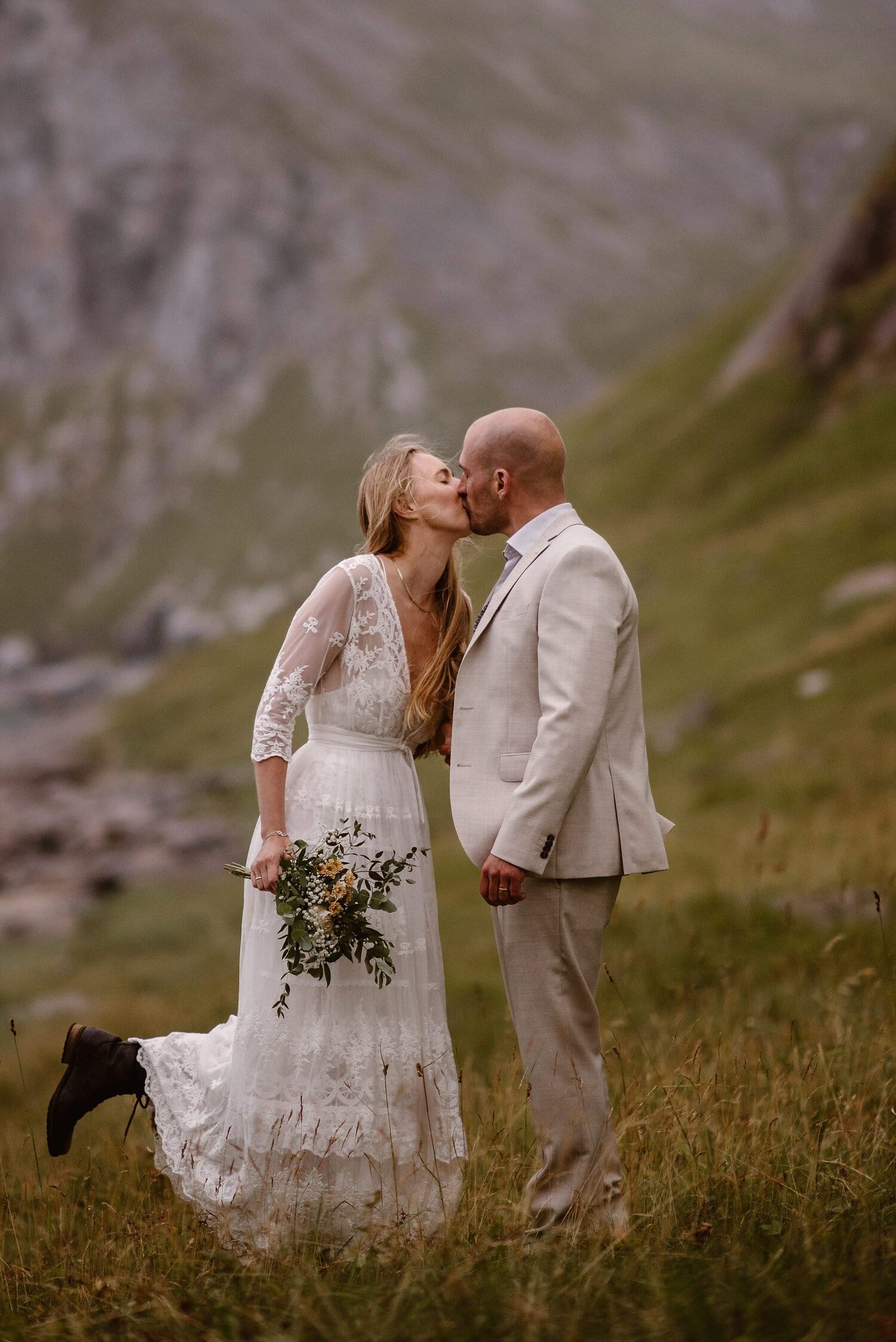 Bride and groom kiss on their elopement day in Norway. 