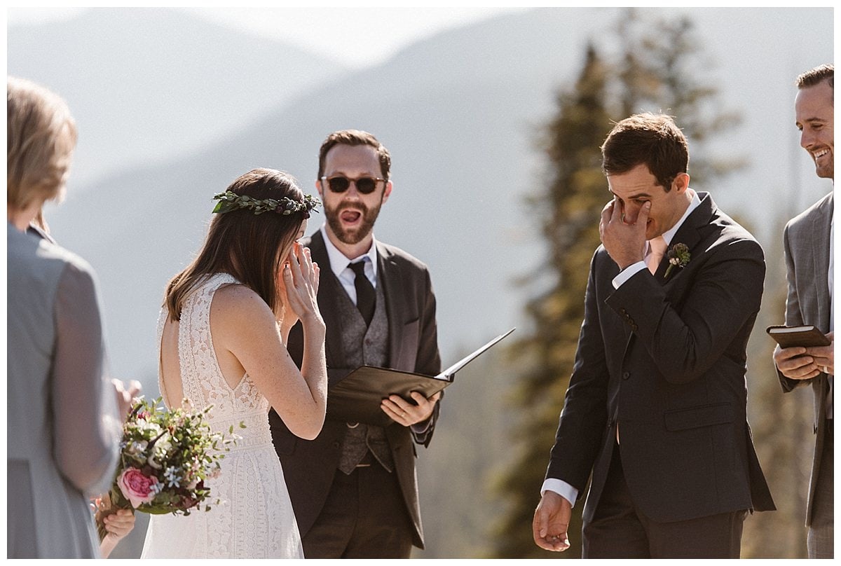 Bride and groom get emotional during  intimate elopement ceremony at Telluride Ski Resort in Colorado. 