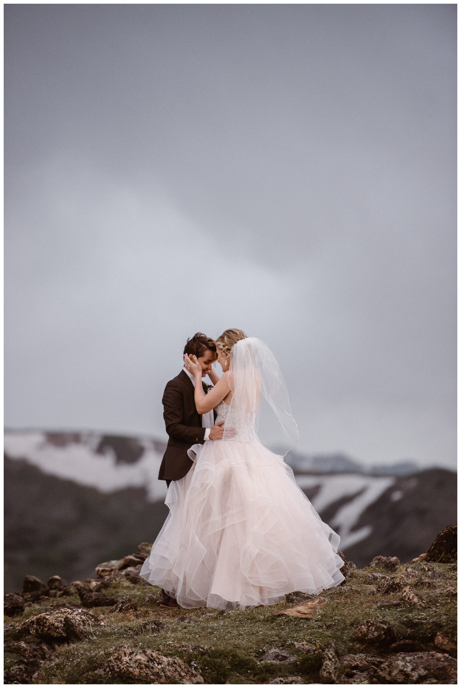 Two brides share a first look at Trail Ridge Road in Rocky Mountain National Park, Colorado. 