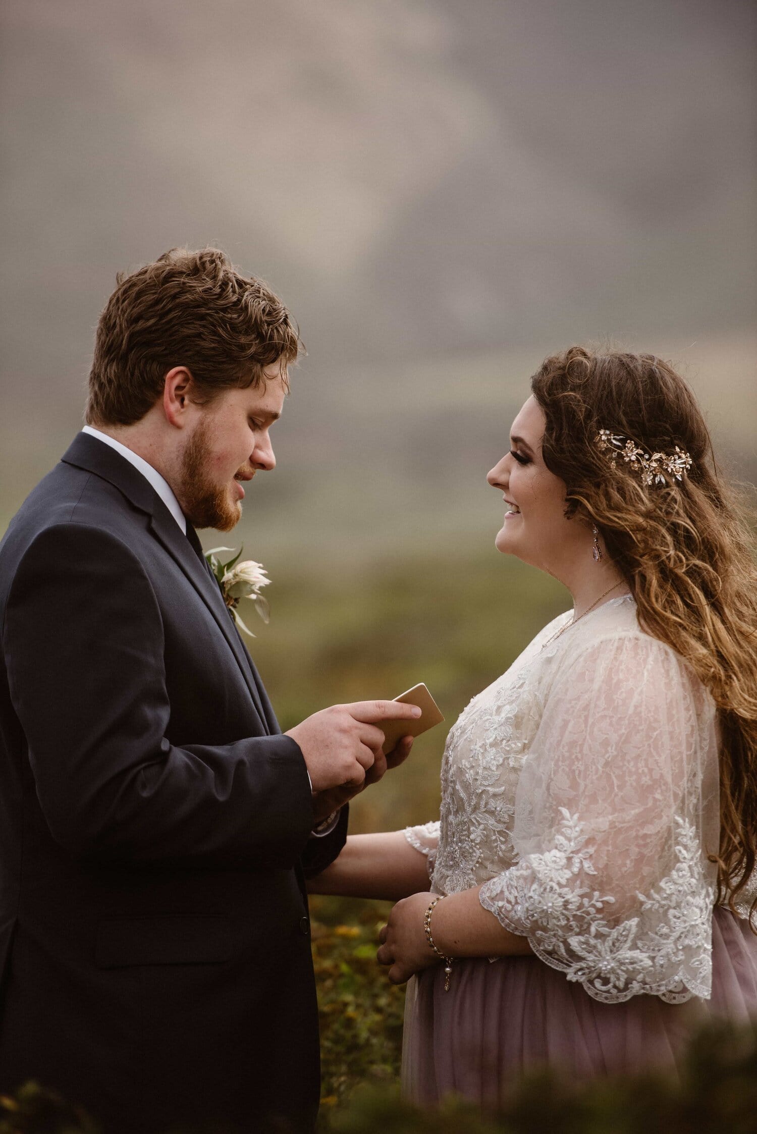 Groom reads his vows to bride on their elopement day in Big Sur, California. 