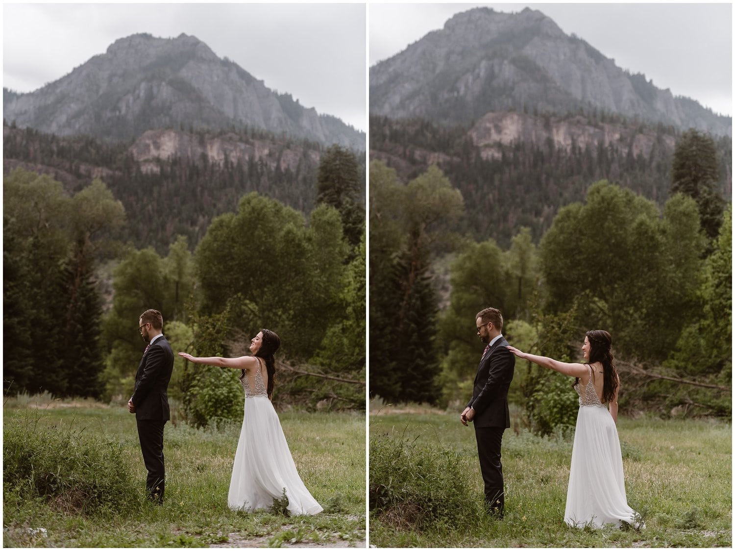 Bride taps groom on shoulder for first look, with mountains in background. 