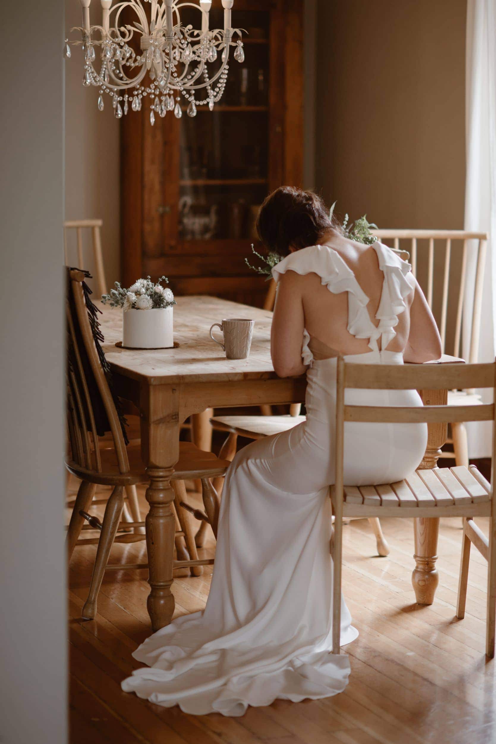 Bride writing her vows in Airbnb in Portland. 