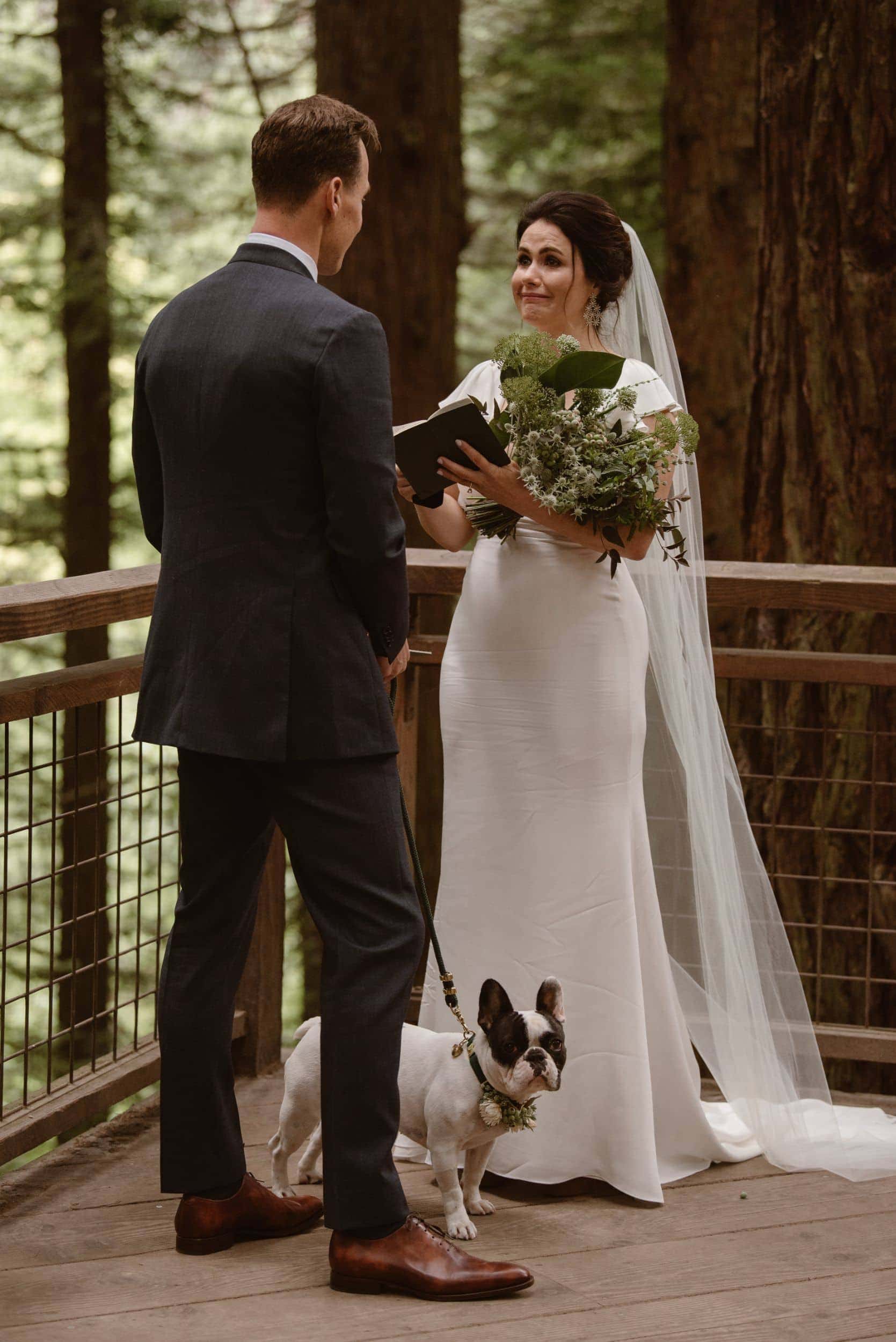 Bride reads her vows at the Redwood Deck at Hoyt Arboretum in Portland, Oregon.