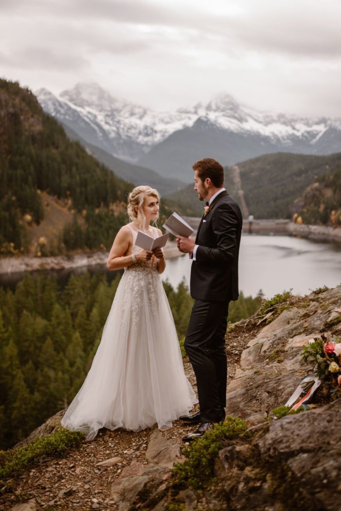 Bride and groom read vows to each other on Orcas Island. 
