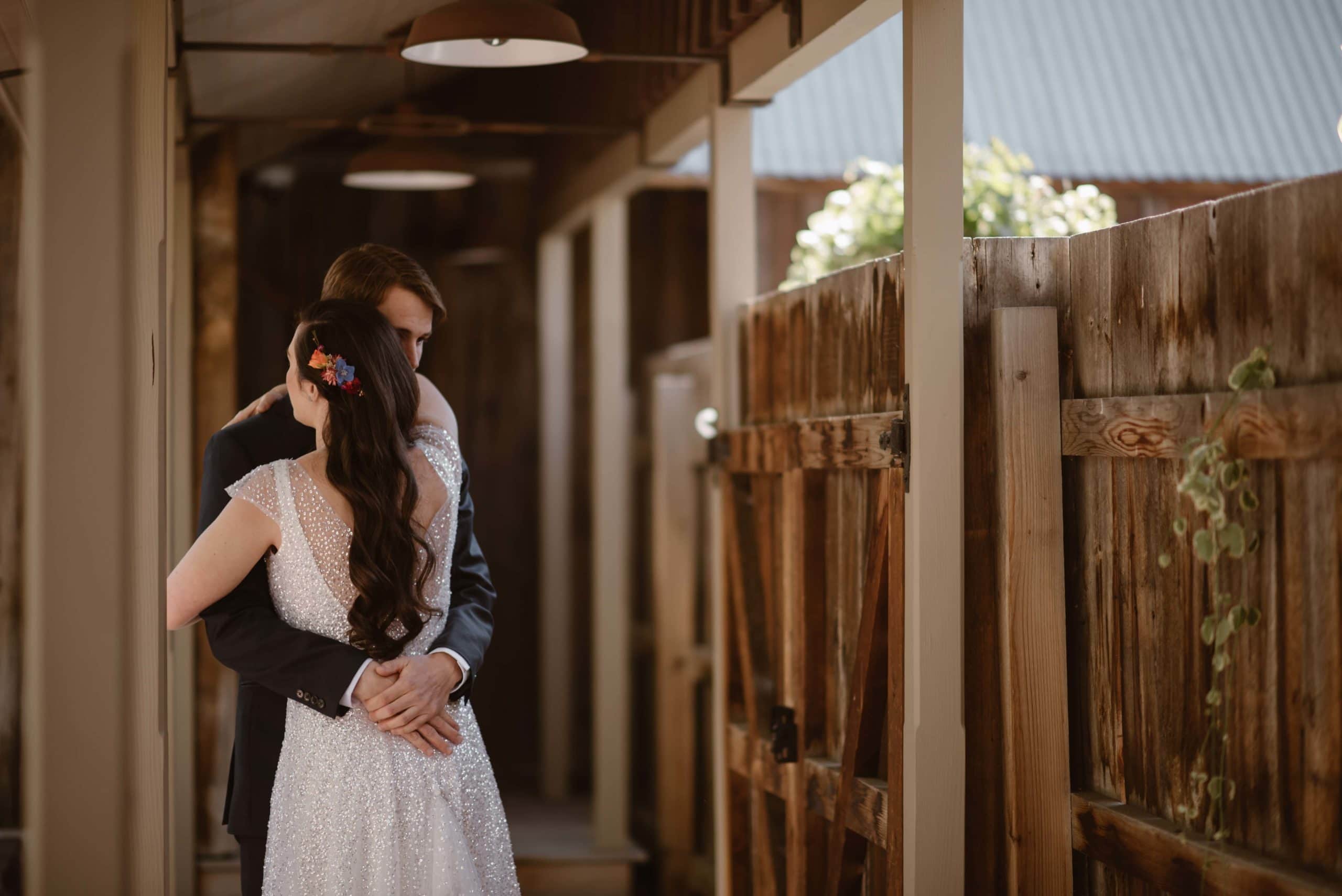 Bride and groom embrace during a first look on their elopement day in Crested Butte, Colorado.